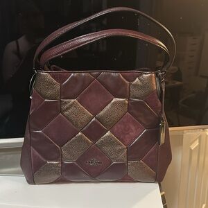 Maroon coach quilt bag